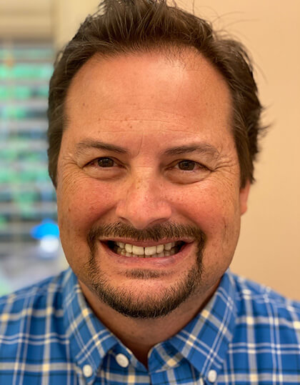 Stan smiling before smile makeover