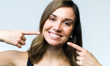 Woman smiling after cosmetic dentistry in Mount Pleasant