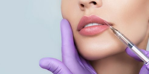 Patient receiving lip fillers