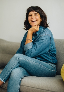 Smiling dental patient in waiting room