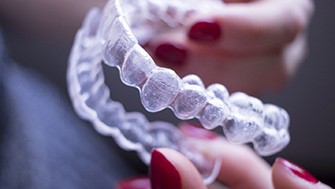 Insurance benefits paperwork with pen and glasses