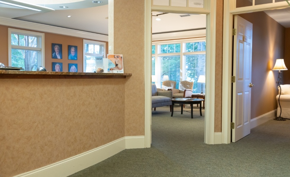 Hallway looking into dental office waiting room