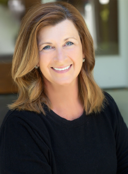 Dental office concierge and dental assistant Amy